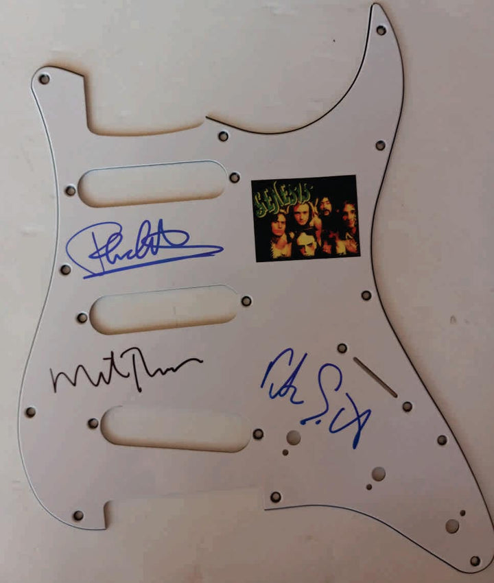 Genesis Peter Gabriel, Phil Collins, Tony Banks, and Mike Rutherford guitar pick guard signed with proof - Awesome Artifacts 