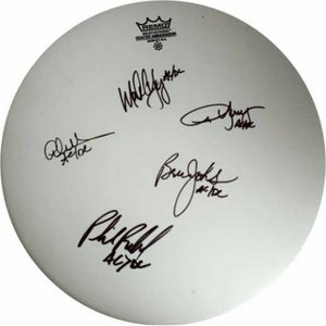 Malcolm and Angus Young, Brian Johnson, Cliff Williams, Phil Rudd AC/DC 14 inch Remo drum heads signed with proof