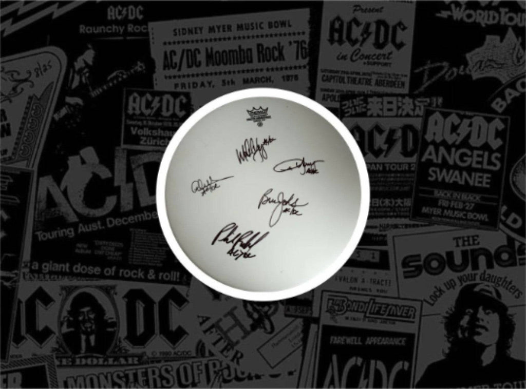 Malcolm and Angus Young, Brian Johnson, Cliff Williams, Phil Rudd AC/DC 14 inch Remo drum heads signed with proof