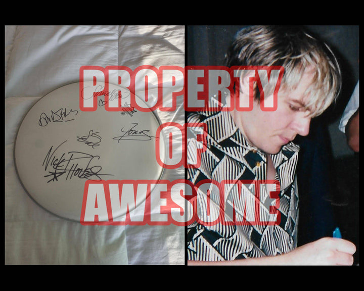 Simon Le Bon, Nick Rhodes, John Taylor, Duran Duran 14in Remo drumhead signed with proof - Awesome Artifacts 