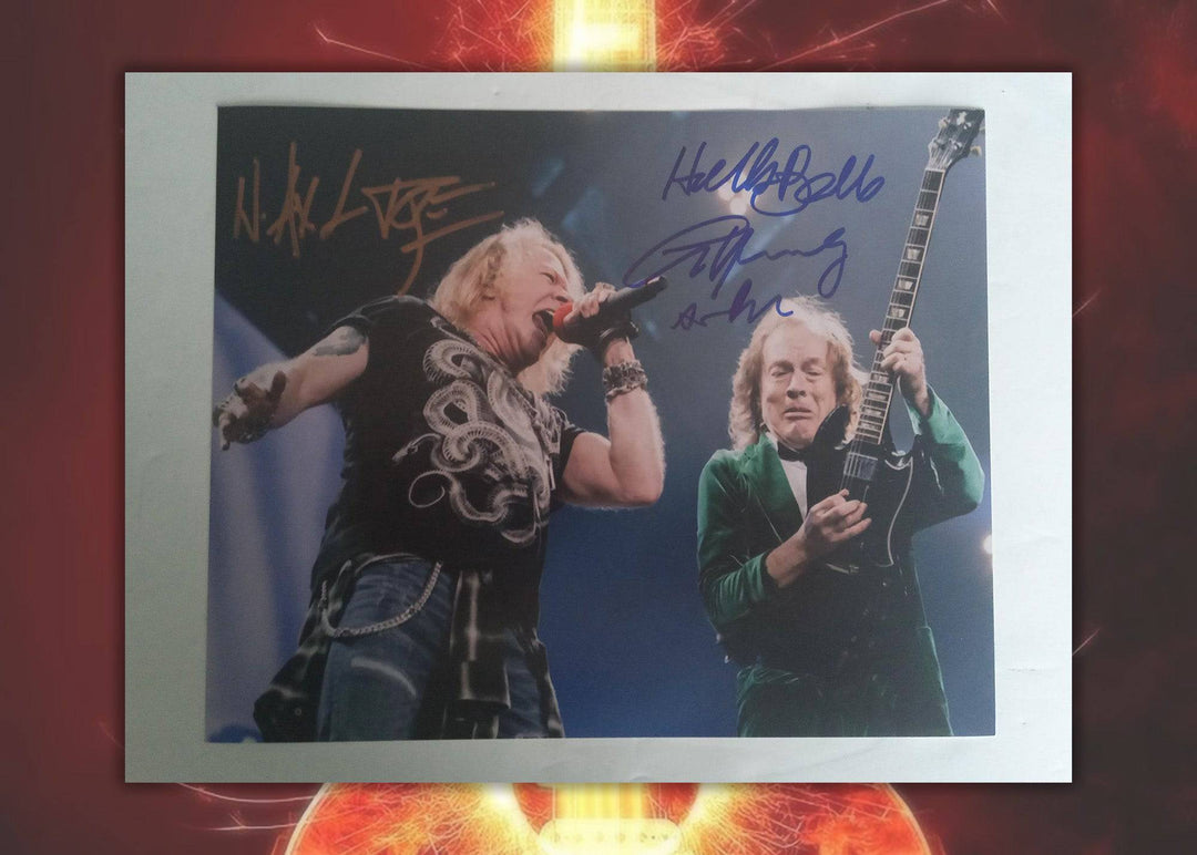 W. Axl Rose and Angus Young 8 x 10 photo signed with proof - Awesome Artifacts 