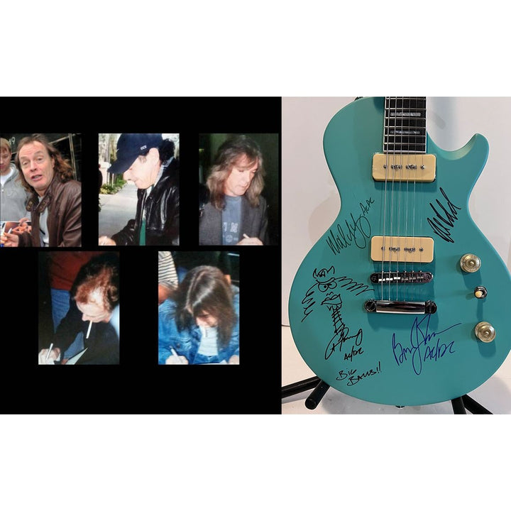 AC/DC Angus Young Brian Johnson Malcolm Young Phil Rudd Les Paul electric guitars signed with proof