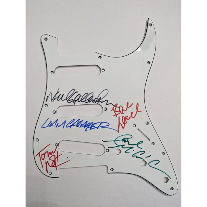 Liam and Noel Gallagher Oasis band signed Fender Stratocaster electric guitar pickguard signed with proof