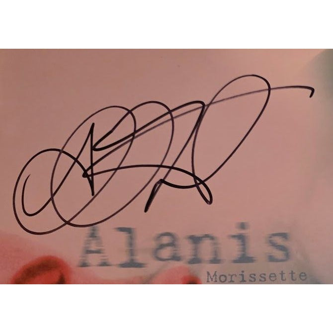 Alanis Morissette 'Jagged Little Pill' original LP signed with proof.