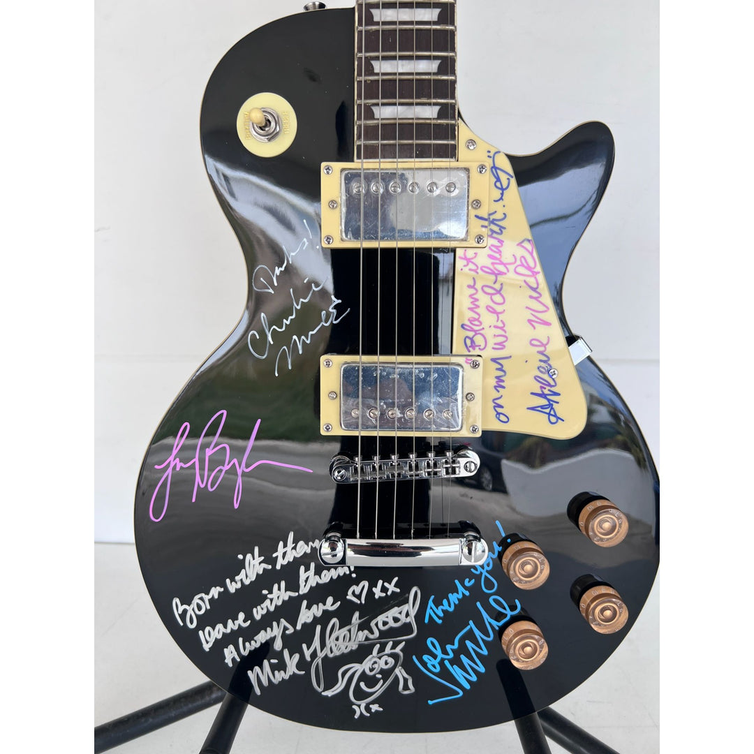 Fleetwood Mac vintage les paul signed by Mick Fleetwood, Christine McVie, John McVie, Stevie Nicks and Lindsey Buckingham signed with proof.