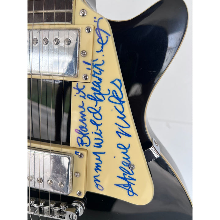 Fleetwood Mac vintage les paul signed by Mick Fleetwood, Christine McVie, John McVie, Stevie Nicks and Lindsey Buckingham signed with proof.
