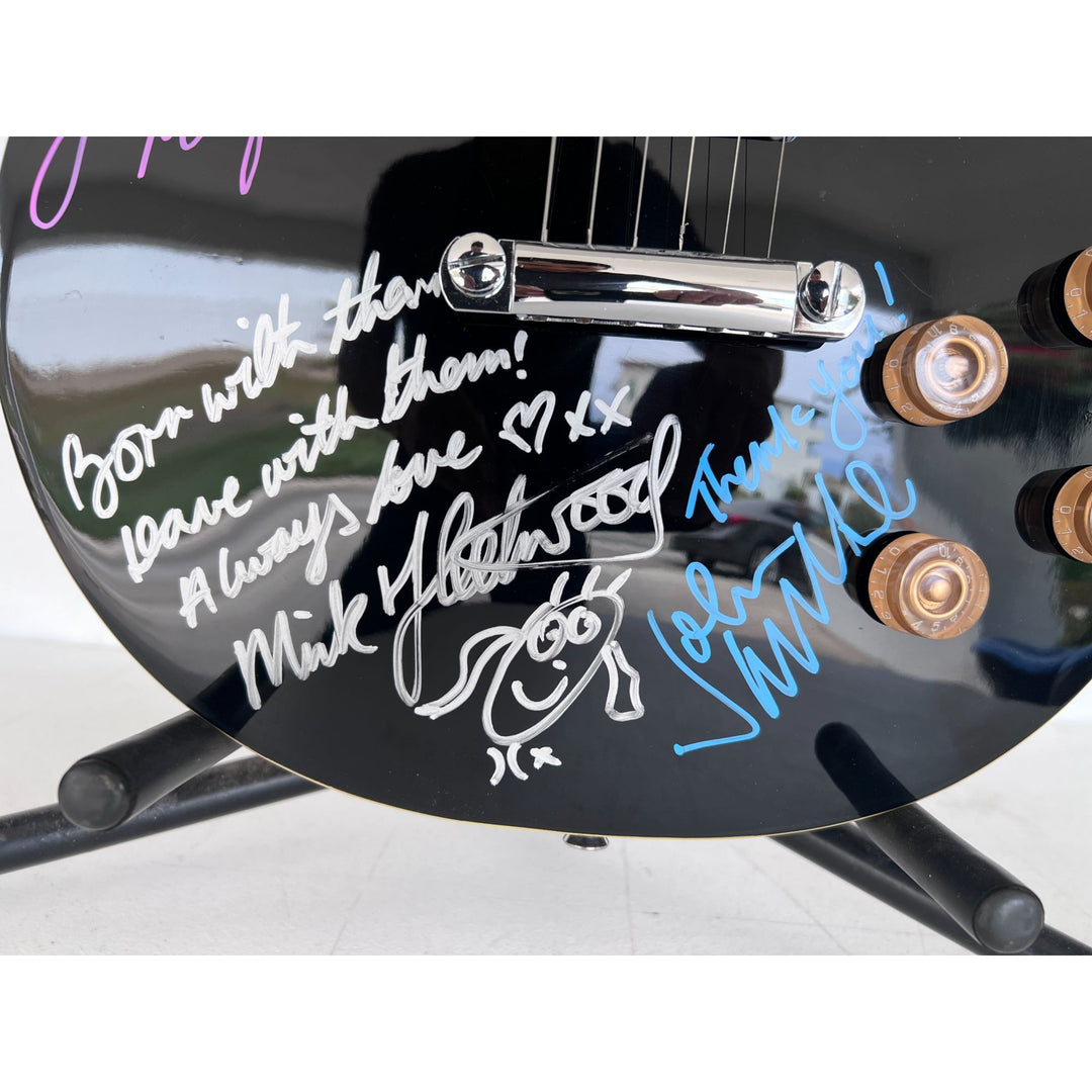 Fleetwood Mac vintage les paul signed by Mick Fleetwood, Christine McVie, John McVie, Stevie Nicks and Lindsey Buckingham signed with proof.