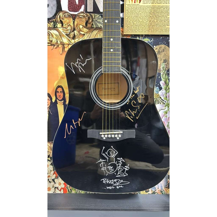 Genesis Phil Collins, Tony Banks, Peter Gabriel, Mike Rutherford full size acoustic guitar signed with proof and museum quality frame 29x54