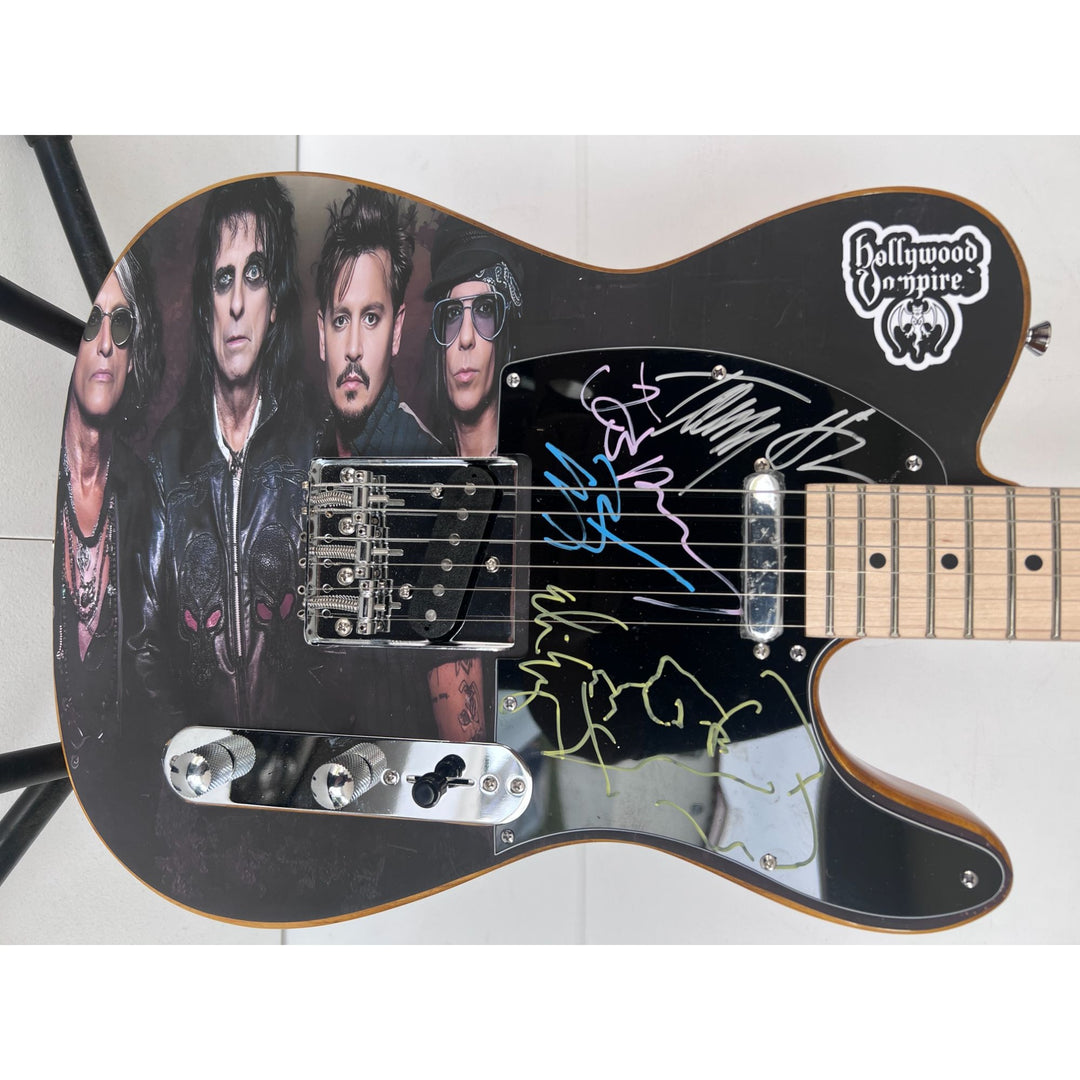 Hollywood Vampires, Joe Perry, Johnny Depp, Alice Cooper, Tommy Henricksen one of a kind Telecaster electric guitar signed with proof.
