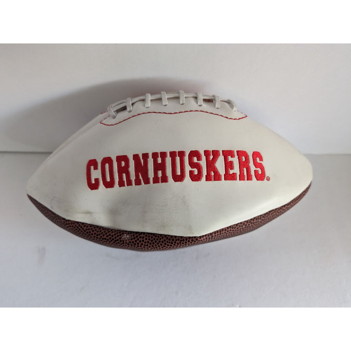 Nebraska Cornhuskers Heisman Trophy award winners Johnny Rodgers Eric Crouch Mike Rozier full size football signed