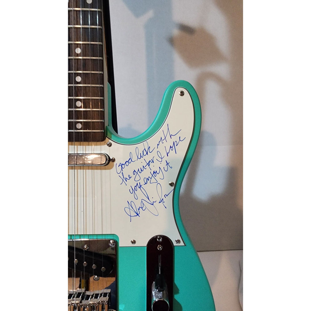 Rush Neil Peart,  Alex Lifeson (inscription), Geddy Lee  original Fender telecaster full size electric guitar signed with proof