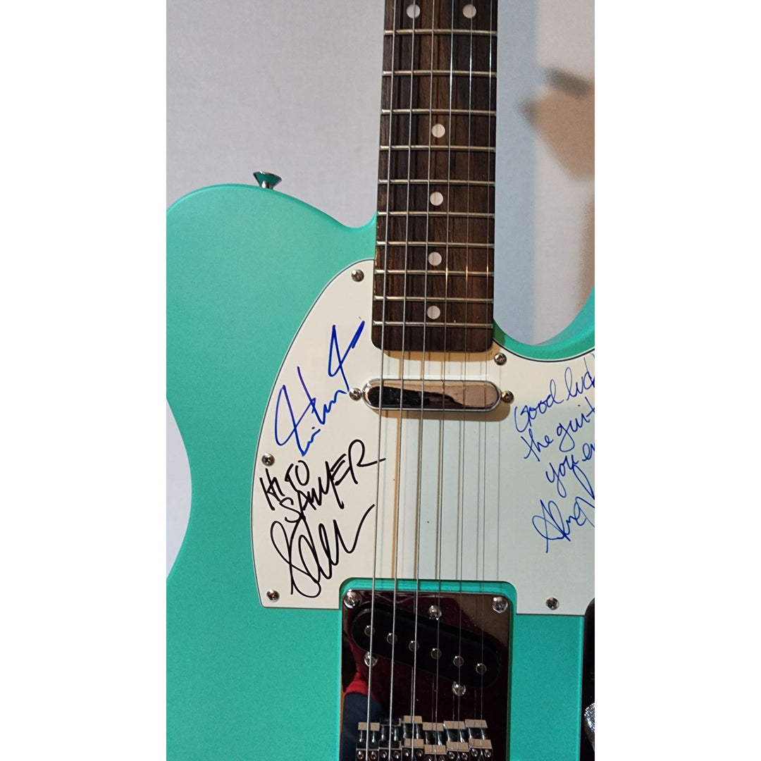 Rush Neil Peart,  Alex Lifeson (inscription), Geddy Lee  original Fender telecaster full size electric guitar signed with proof