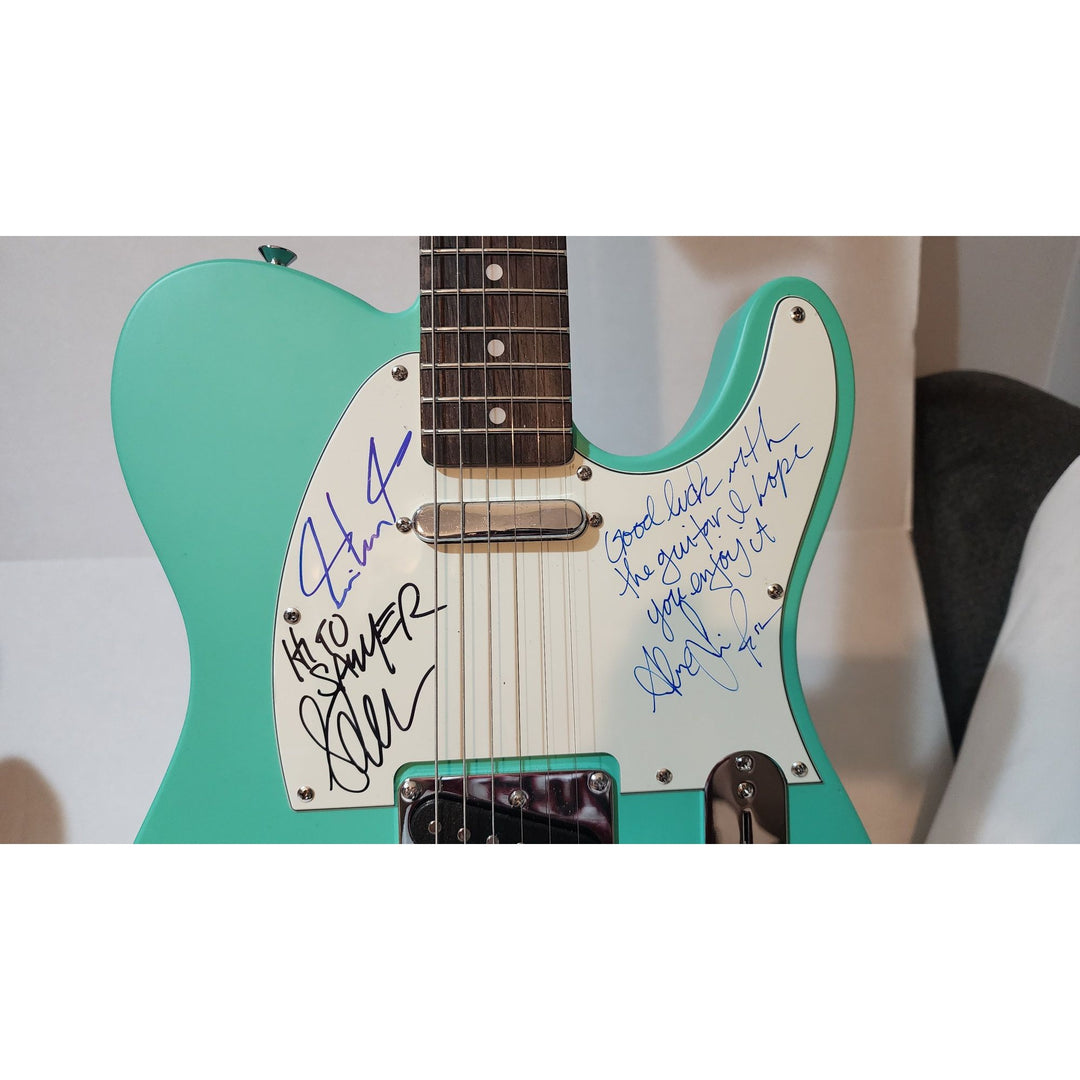 Rush Neil Peart,  Alex Lifeson (inscription), Geddy Lee  original Fender telecaster full size electric guitar signed with proof