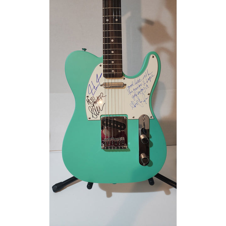 Rush Neil Peart,  Alex Lifeson (inscription), Geddy Lee  original Fender telecaster full size electric guitar signed with proof