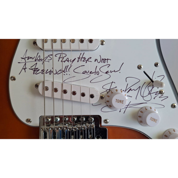 Jeff Beck & Stevie Ray Vaughan signed "Always Play Her with a Feeling" Fender Stratocaster Squier electric guitar signed with proof