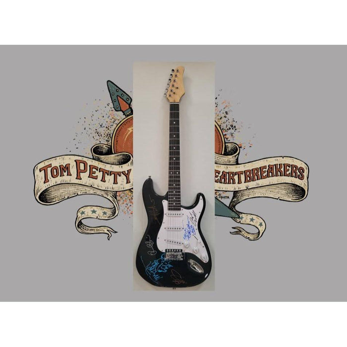 Tom Petty (with sketch) and The Heartbreakers, Ron Blair, Benmont Tench, Scott Thurston, and Mike Campbell full size electric guitar signed