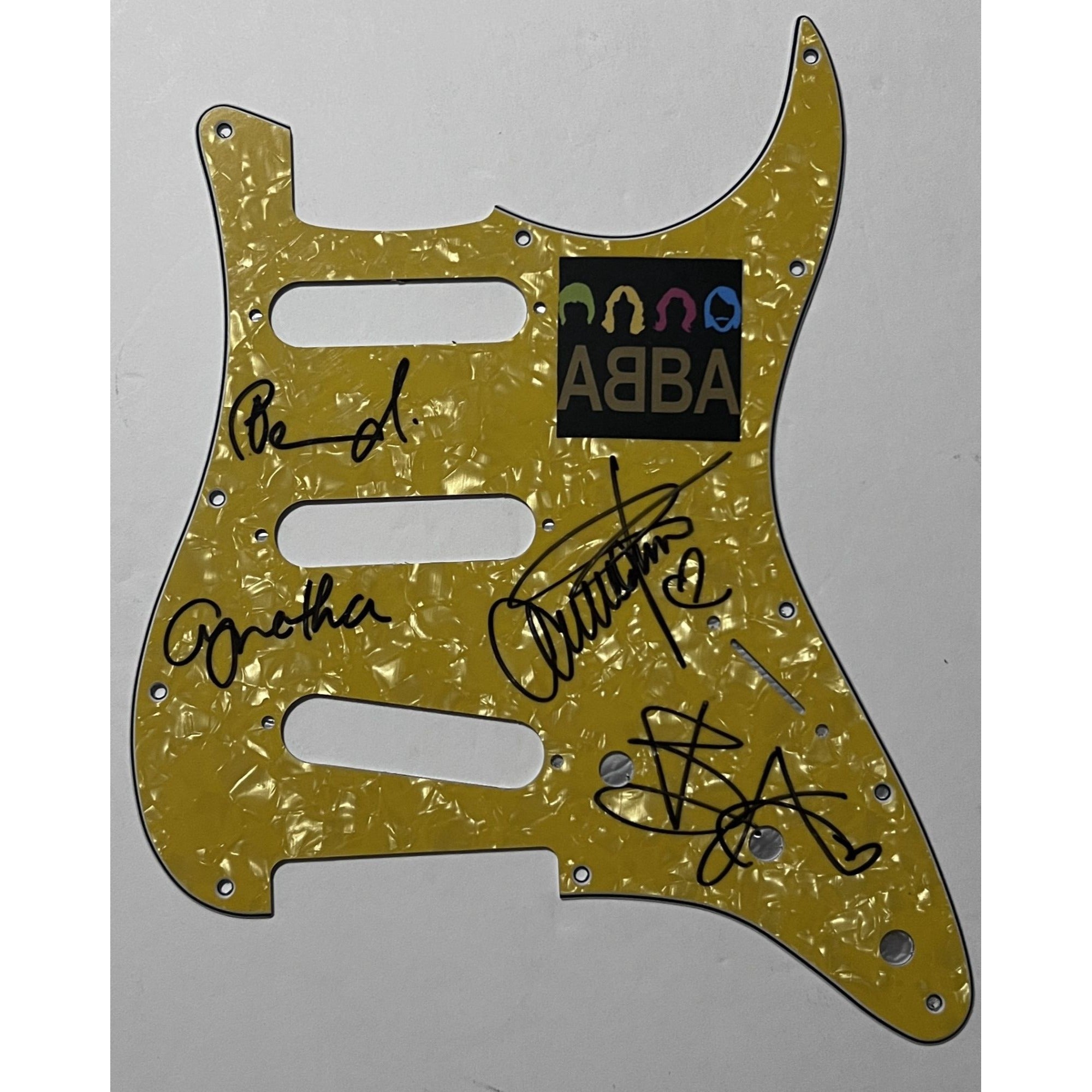 Benny Andersson, Anni-Frid Lyngstad, ABBA  Stratocaster electric pickguard signed with proof