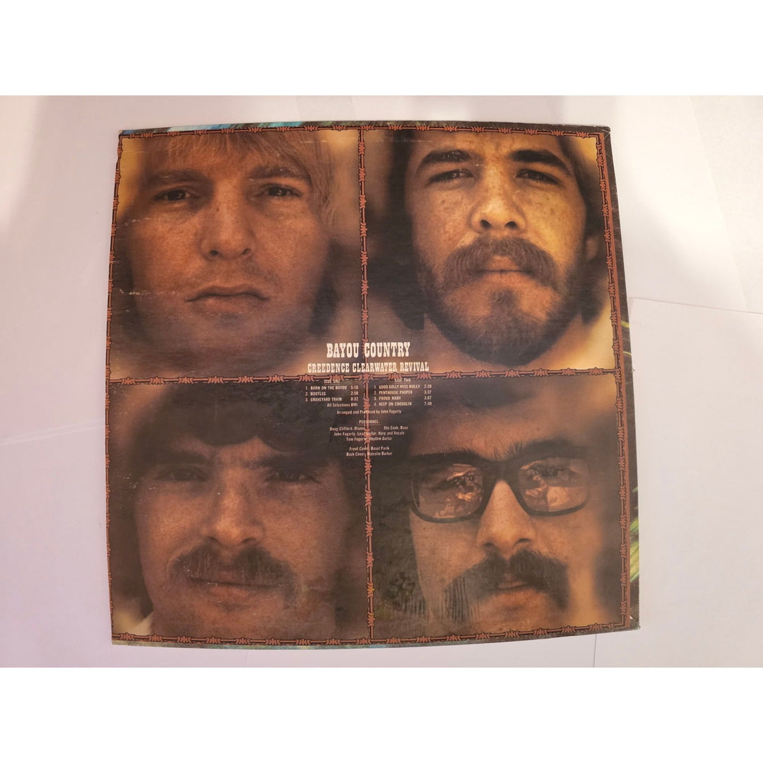 Creedence Clearwater Revival CCR "Bayou Country" LP signed with proof.