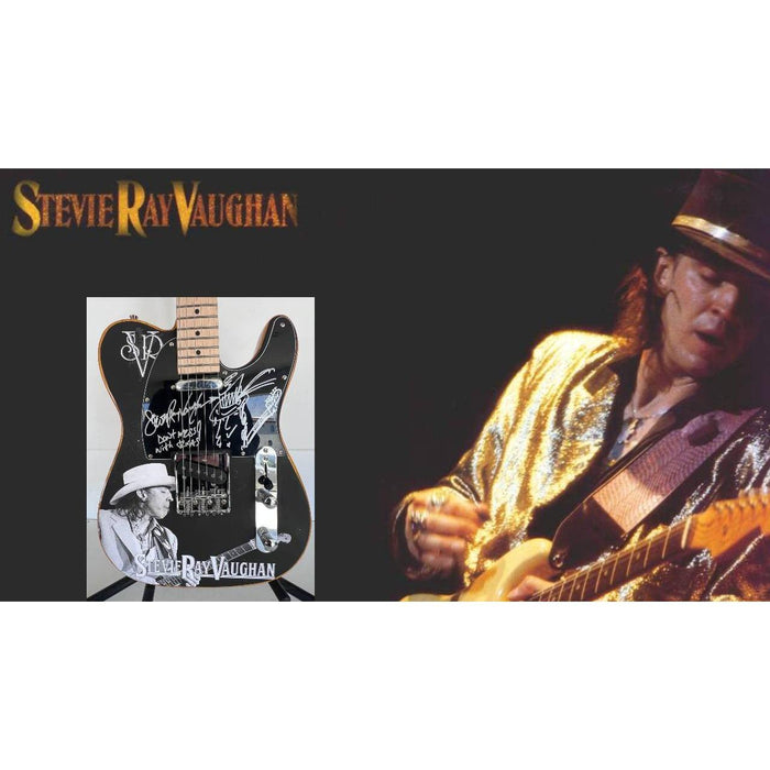 Stevie Ray Vaughan signed one of a kind full size electric guitar signed with proof
