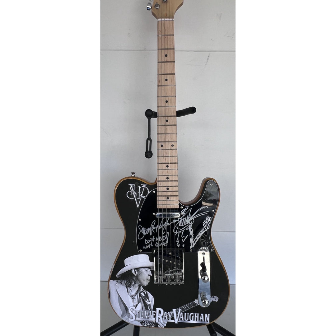 Stevie Ray Vaughan signed one of a kind full size electric guitar signed with proof.
