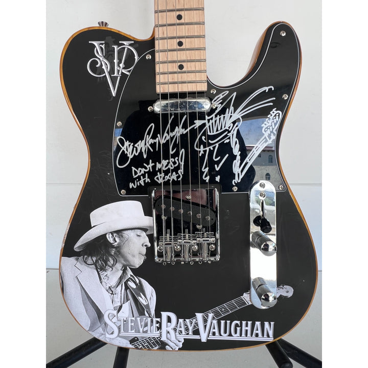 Stevie Ray Vaughan signed one of a kind full size electric guitar signed with proof.