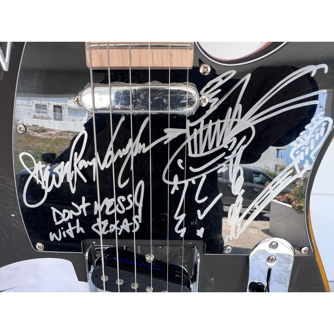 Stevie Ray Vaughan signed one of a kind full size electric guitar signed with proof.