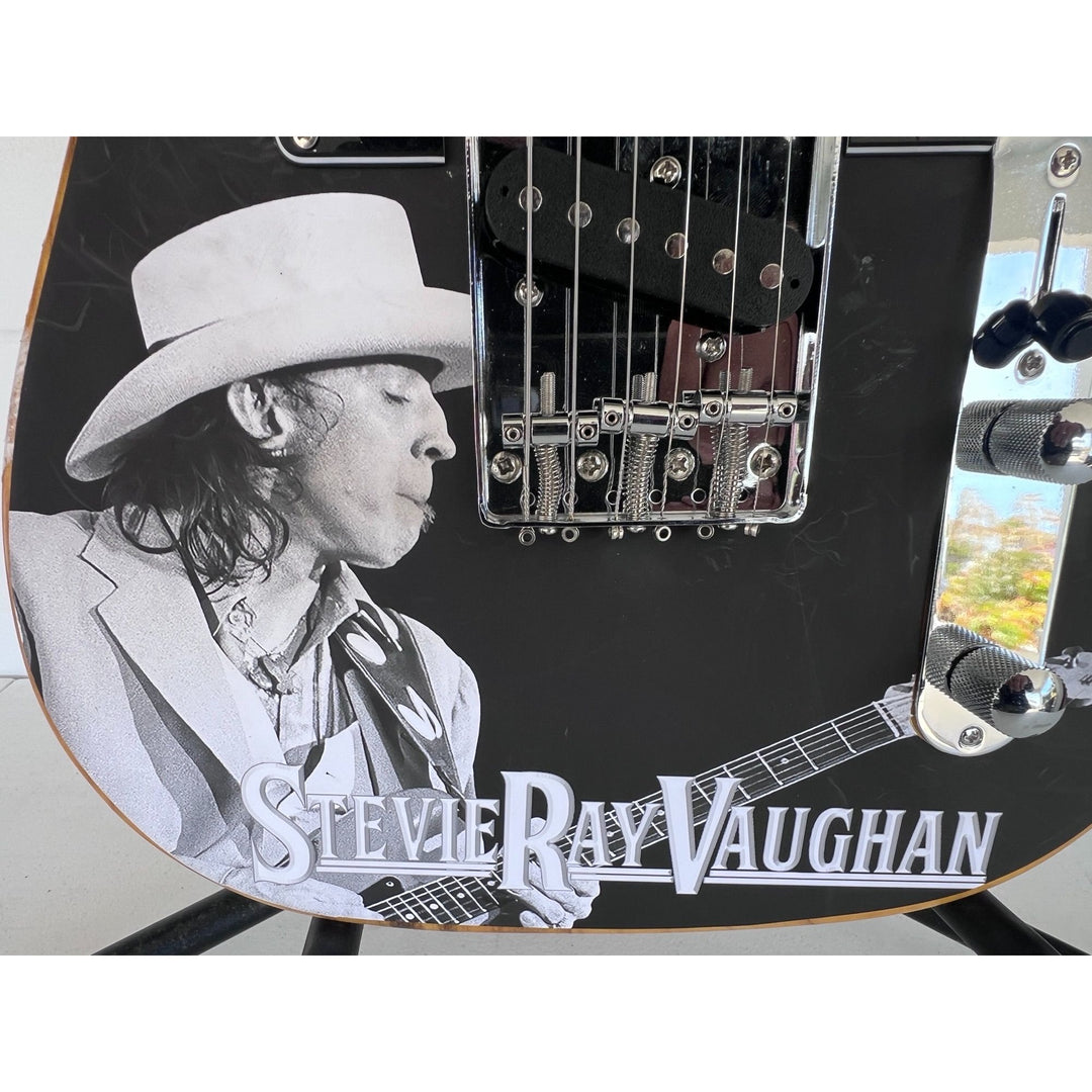Stevie Ray Vaughan signed one of a kind full size electric guitar signed with proof.