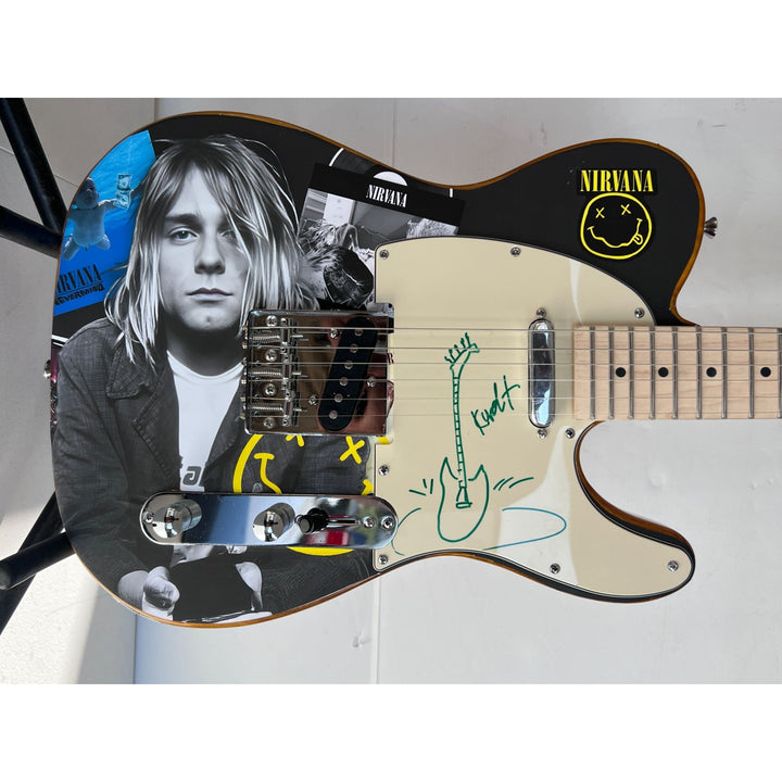 Kurt Cobain of Nirvana telecaster electric guitar signed with proof.