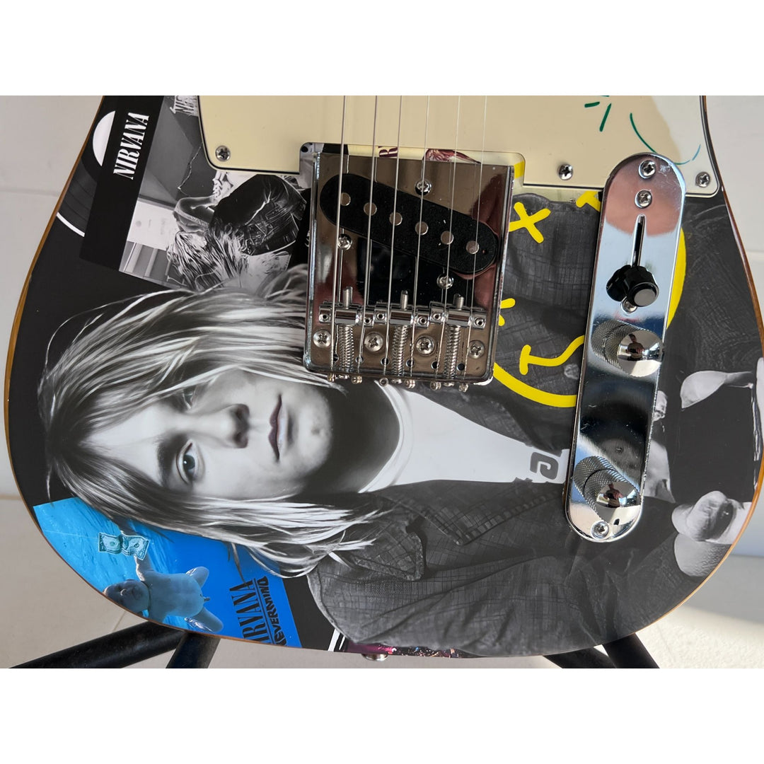 Kurt Cobain of Nirvana telecaster electric guitar signed with proof.