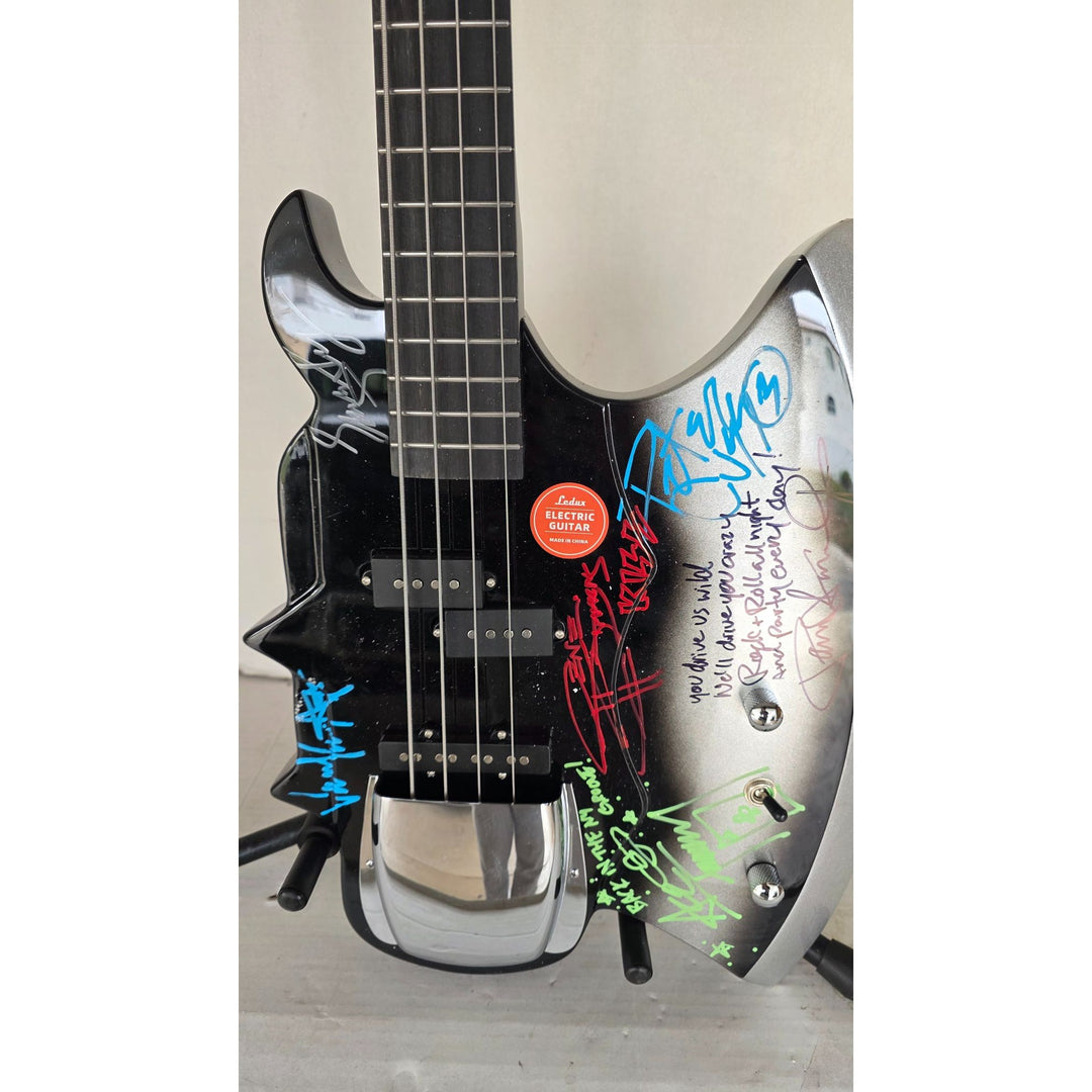 Kiss Gene Simmons Peter Criss, Paul Stanley, Ace Frehley and Eric Singer axe bass guitar signed with proof.