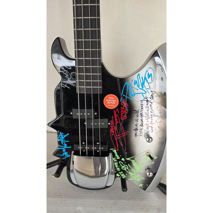 Kiss Gene Simmons Peter Criss, Paul Stanley, Ace Frehley and Eric Singer axe bass guitar signed with proof.