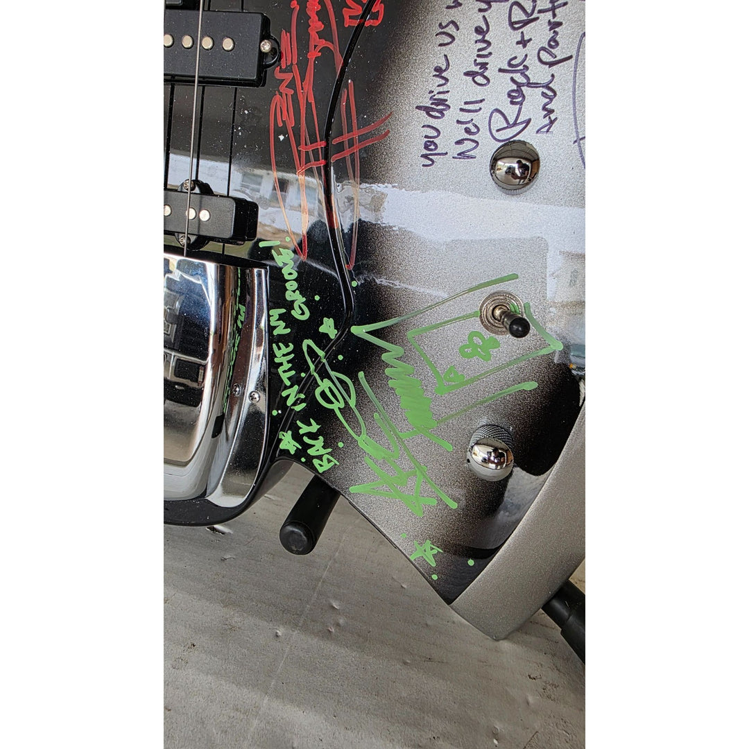 Kiss Gene Simmons Peter Criss, Paul Stanley, Ace Frehley and Eric Singer axe bass guitar signed with proof.