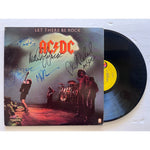 Load image into Gallery viewer, Angus young Malcolm Young Brian Johnson Cliff Williams Phil Rudd AC DC Let there be rock lp signed with proof
