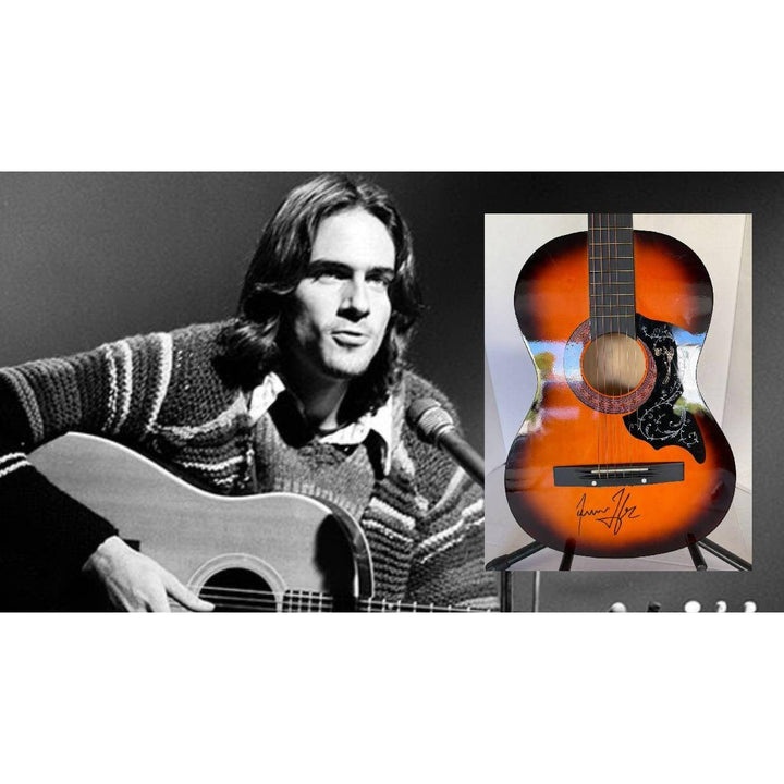Black and white portrait of a man with a guitar next to a signed sunburst acoustic guitar.