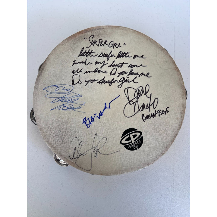 Beach Boys  Brian Wilson, Mike Love, Al Jardine, David Roberts (with lyrics) & proof tambourine 10' signed with proof.
