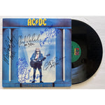 Load image into Gallery viewer, Angus &amp; Malcolm Young Brian Johnson Cliff Williams Phil Rudd AC DC Who made who lp signed with proof
