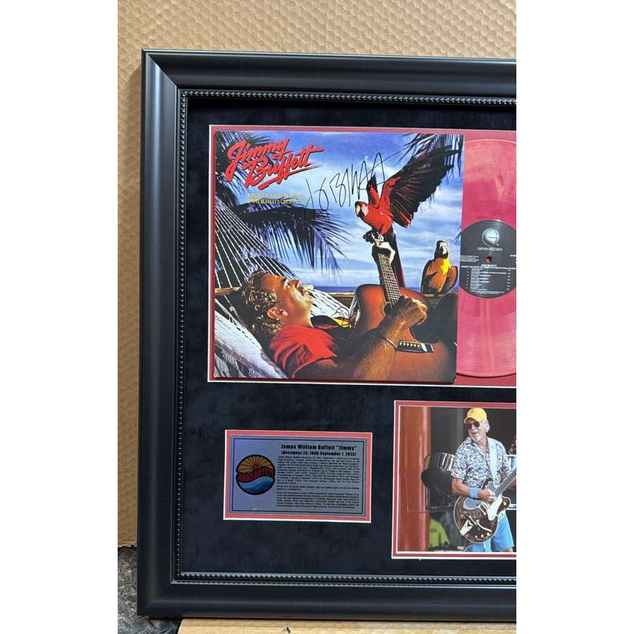 Jimmy Buffett original Lp signed with  proof and museum quality frame 21x23