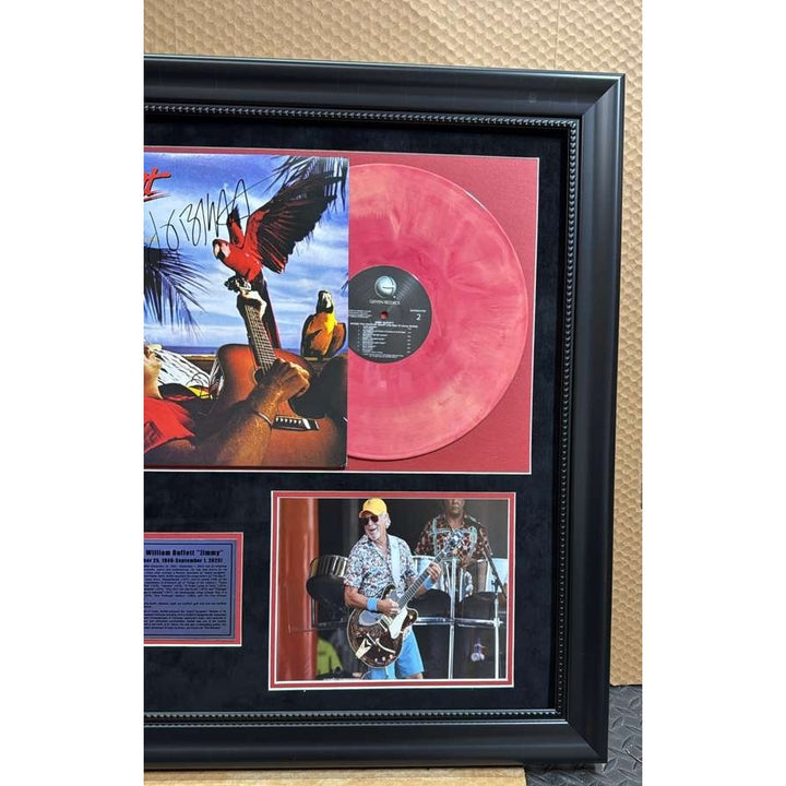 Jimmy Buffett original Lp signed with  proof and museum quality frame 21x23