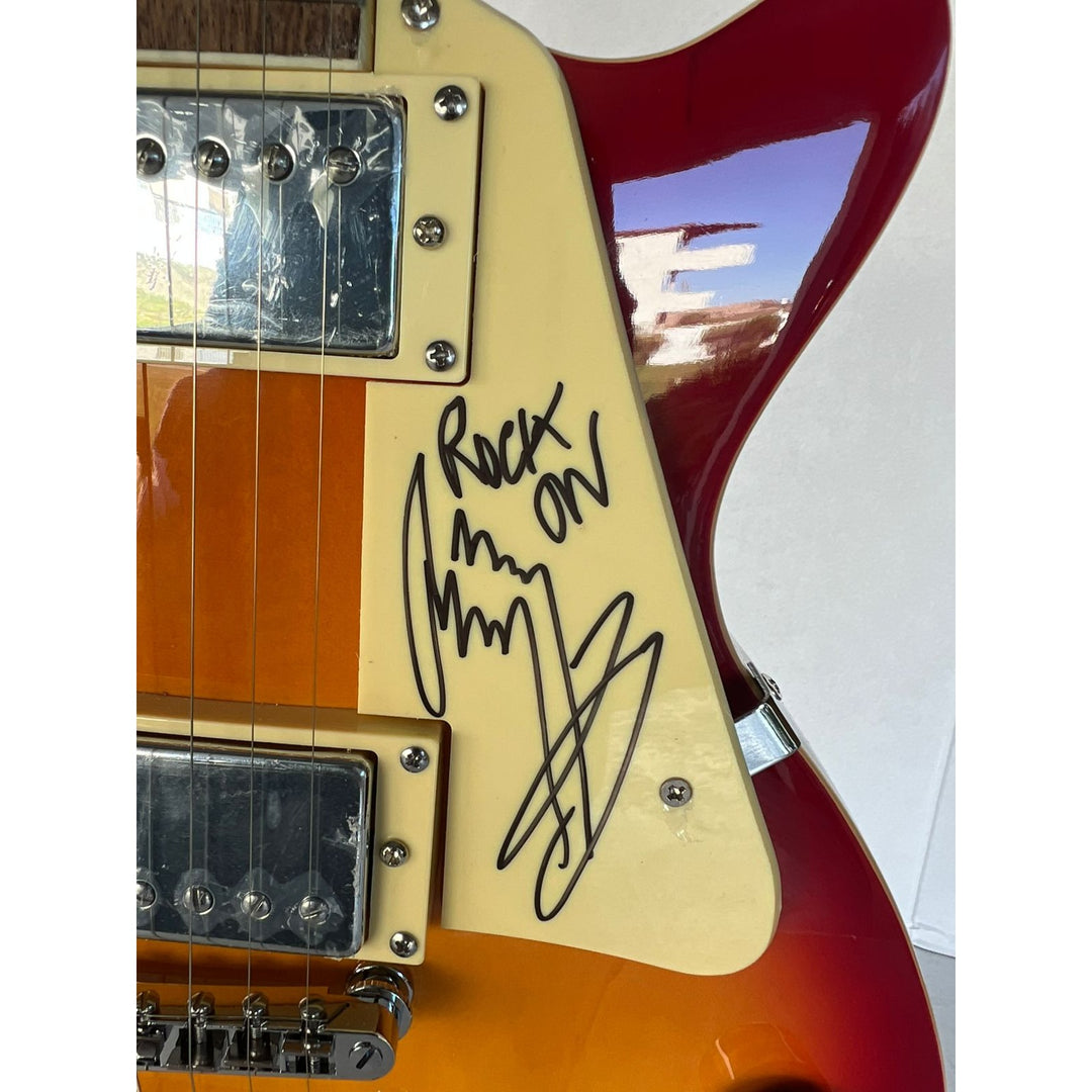 Led Zeppelin Jimmy Page with inscription Rock On! Robert Plant, and John Paul Jones vintage les paul signed with proof.