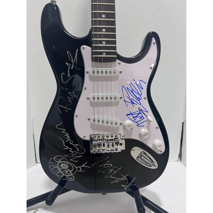 Def Leppard  Phil Collen, Vivian Campbell, Joe Elliott, Rick Savage, Rick Allen. stratocaster electric guitar signed with proof