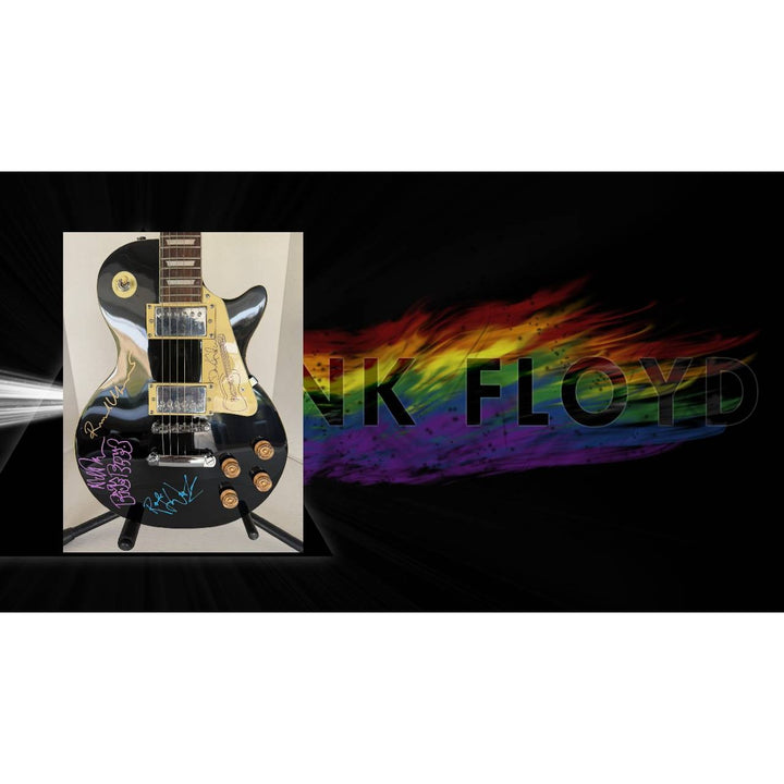 Pink Floyd Roger Waters David Gilmour Richard Wright Nick Mason vintage black les paul electric guitar signed with proof.