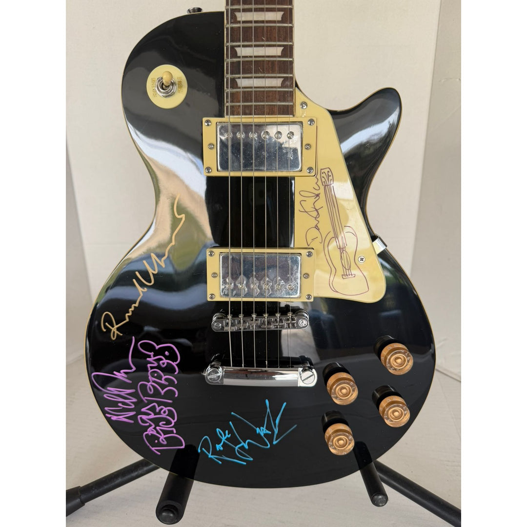 Pink Floyd Roger Waters David Gilmour Richard Wright Nick Mason vintage black les paul electric guitar signed with proof.