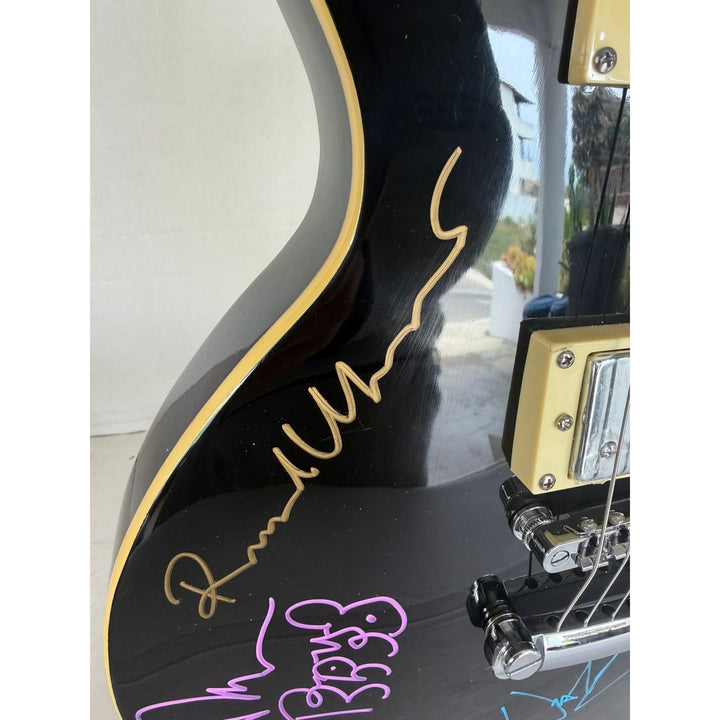 Pink Floyd Roger Waters David Gilmour Richard Wright Nick Mason vintage black les paul electric guitar signed with proof.