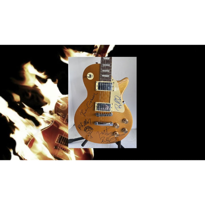 Def Leppard Phil Collen, Vivian Campbell, Joe Elliott, Rick Savage, Rick Allen. Gold Les Paul electric guitar signed with proof