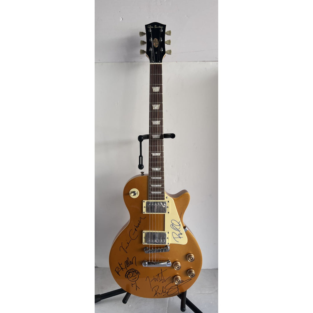 Def Leppard Phil Collen, Vivian Campbell, Joe Elliott, Rick Savage, Rick Allen. Gold Les Paul electric guitar signed with proof