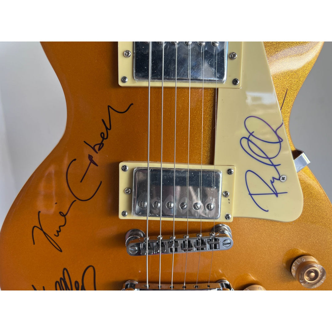 Def Leppard Phil Collen, Vivian Campbell, Joe Elliott, Rick Savage, Rick Allen. Gold Les Paul electric guitar signed with proof