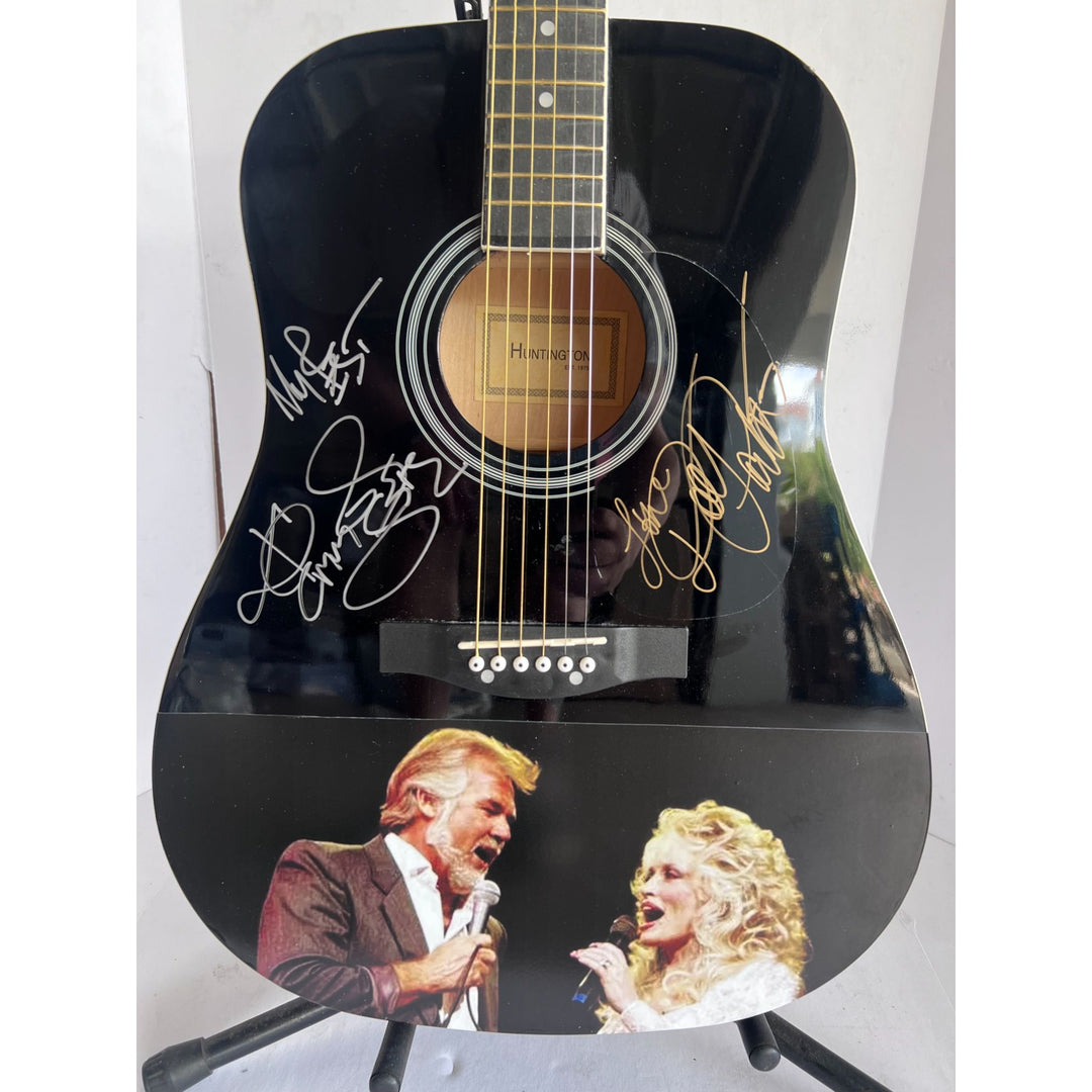 Kenny Rogers and Dolly Parton full size acoustic guitar signed with proof