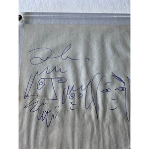 John Lennon The Beatles Co-Vocalist , Song Writer, and lead rhythm guitarist autograph book page signed with sketch & proof