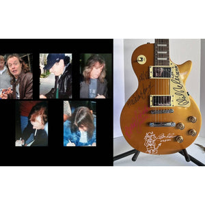 AC/DC Angus Young Brian Johnson Malcolm Young Phil Rudd Les Paul electric guitars signed with proof