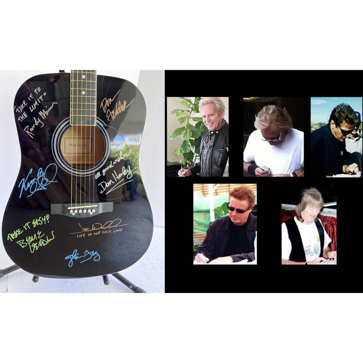 The Eagles Bernie Laden Joe Walsh Don Henley Glenn Frey Randy Meisner signed and inscribed full size acoustic guitar with proof